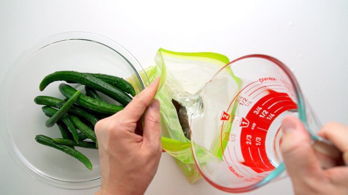 Making a salt brine to pickle Japanese cucumbers.