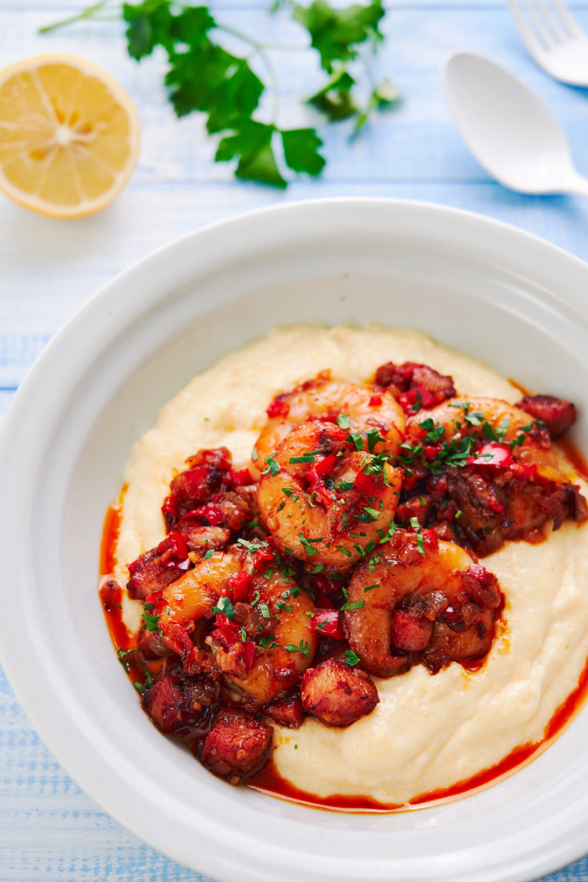 With rich cheesy grits and smoky cajun shrimp, this Shrimp and Grits recipe is guaranteed to make your mouth water.