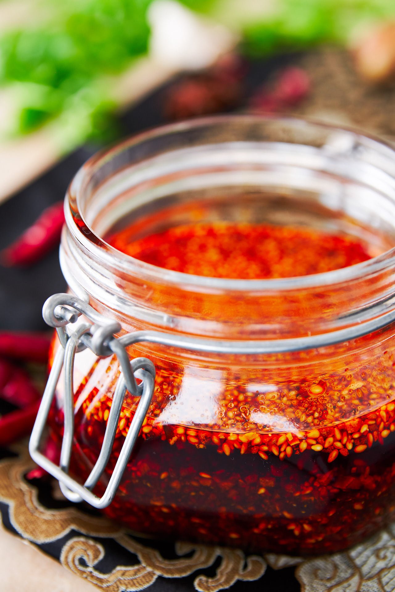 This easy Sichuan-style crispy garlic chili oil comes together in just minutes and makes for a delicious spicy condiment that you'll want to put on everything.