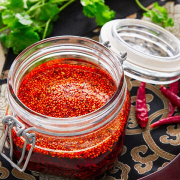 Change up your hot sauce routine with this Sichuan chili oil. Loaded with crisp garlic, sesame seeds and chili flakes it comes together in just minutes from a handful of ingredients.