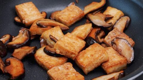 Soy sauce glazed pan-fried tofu and shiitake mushrooms.