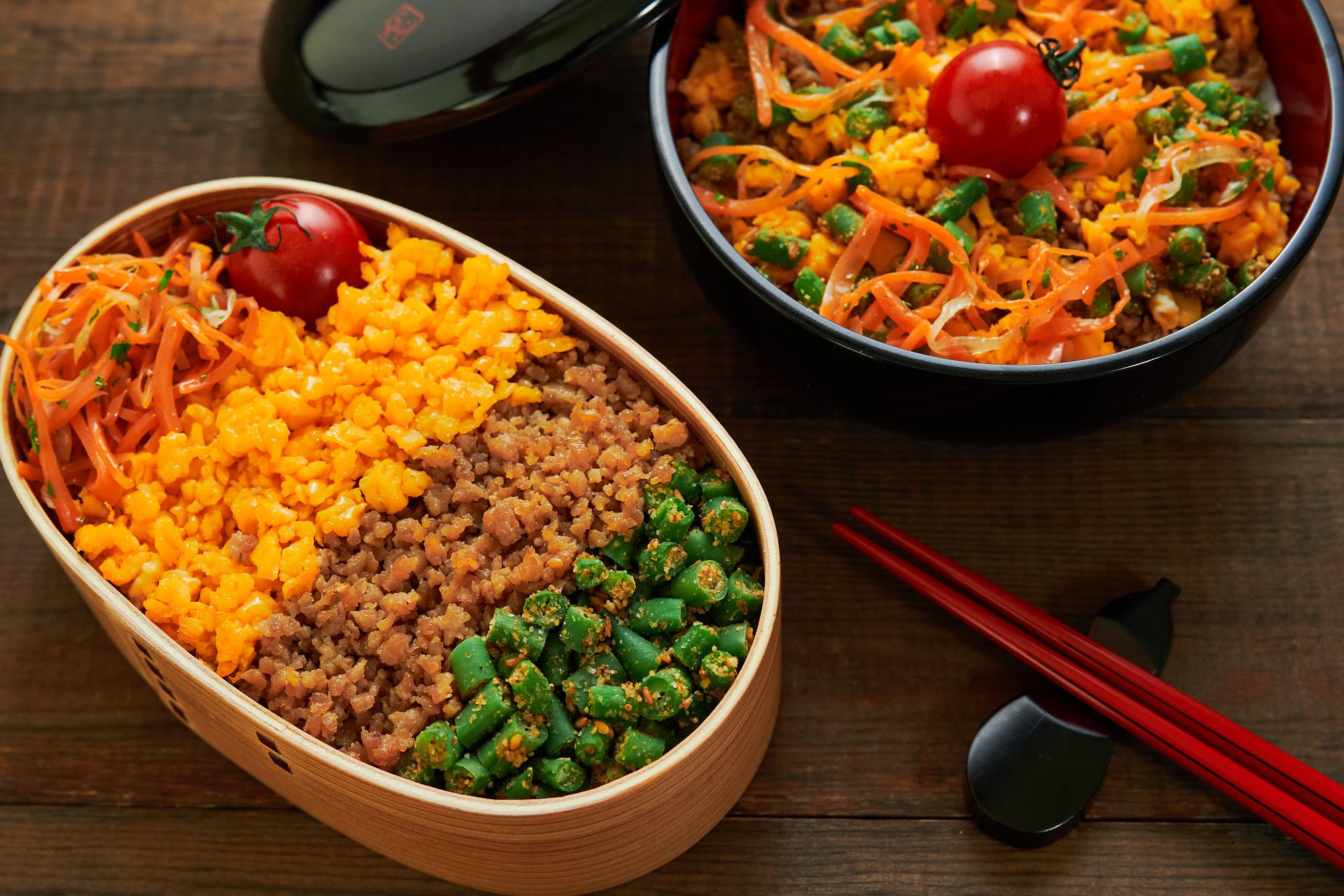 Soboro bento packed two different ways, in a donburi, as well as a mage-wappa wooden bento box.