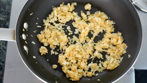 Sauteeing the onions and garlic boosts the flavor of your meatballs.