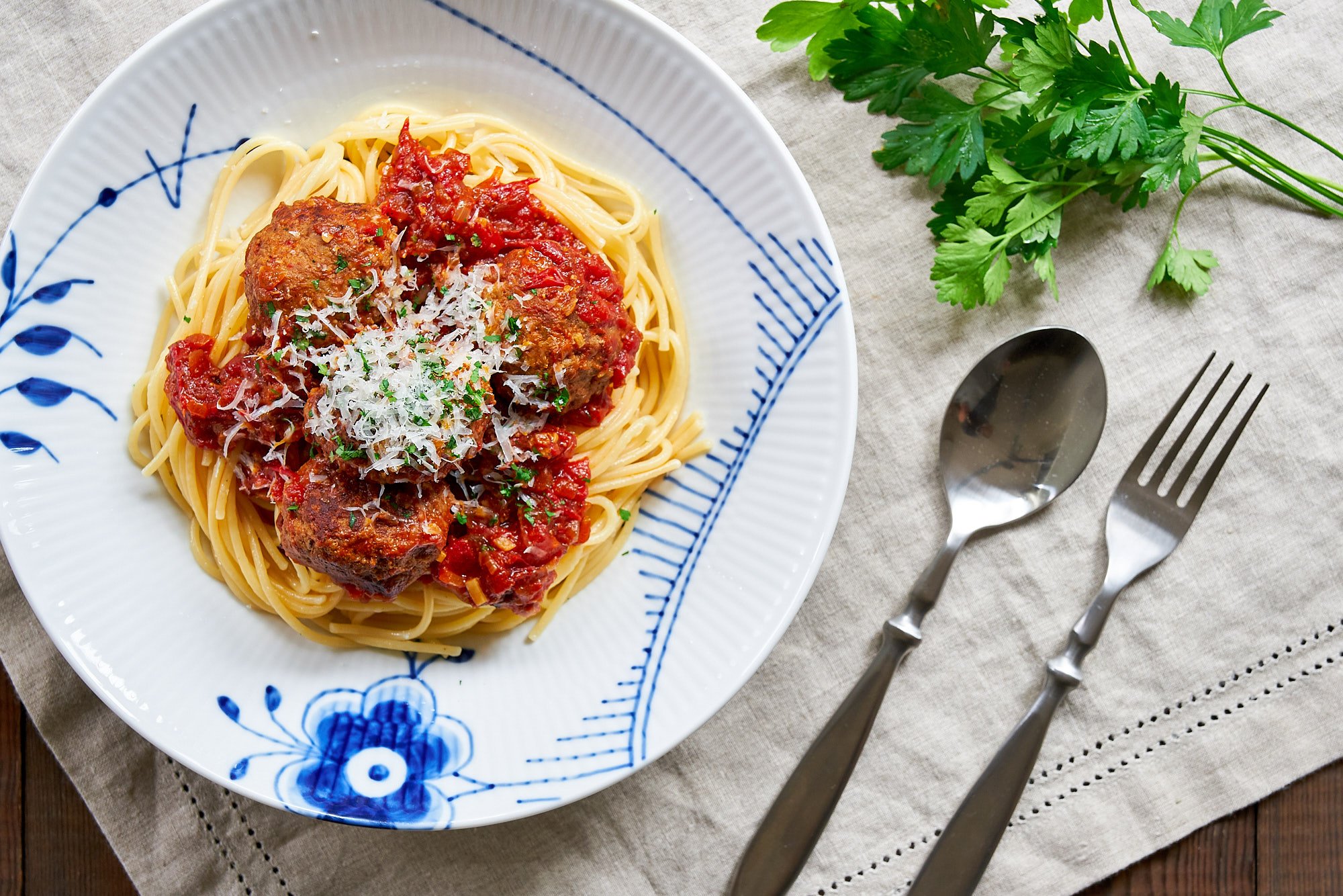 How to make the best spaghetti and meatballs with big juicy meatballs in a fresh tomato sauce from scratch.