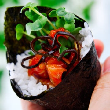 This mouthwatering spicy salmon temaki sushi is rolled in crisp nori and tangy sushi rice and doesn't require any special tools to make.