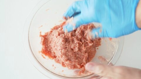 Making the filling for Sichuan-style wontons in chili oil.