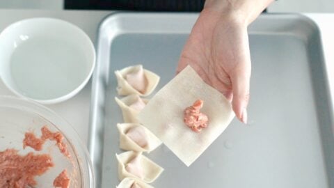 Wrapping sichuan-style wontons.