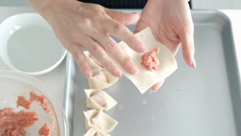 Making the best Sichuan-style wontons in chili oil.