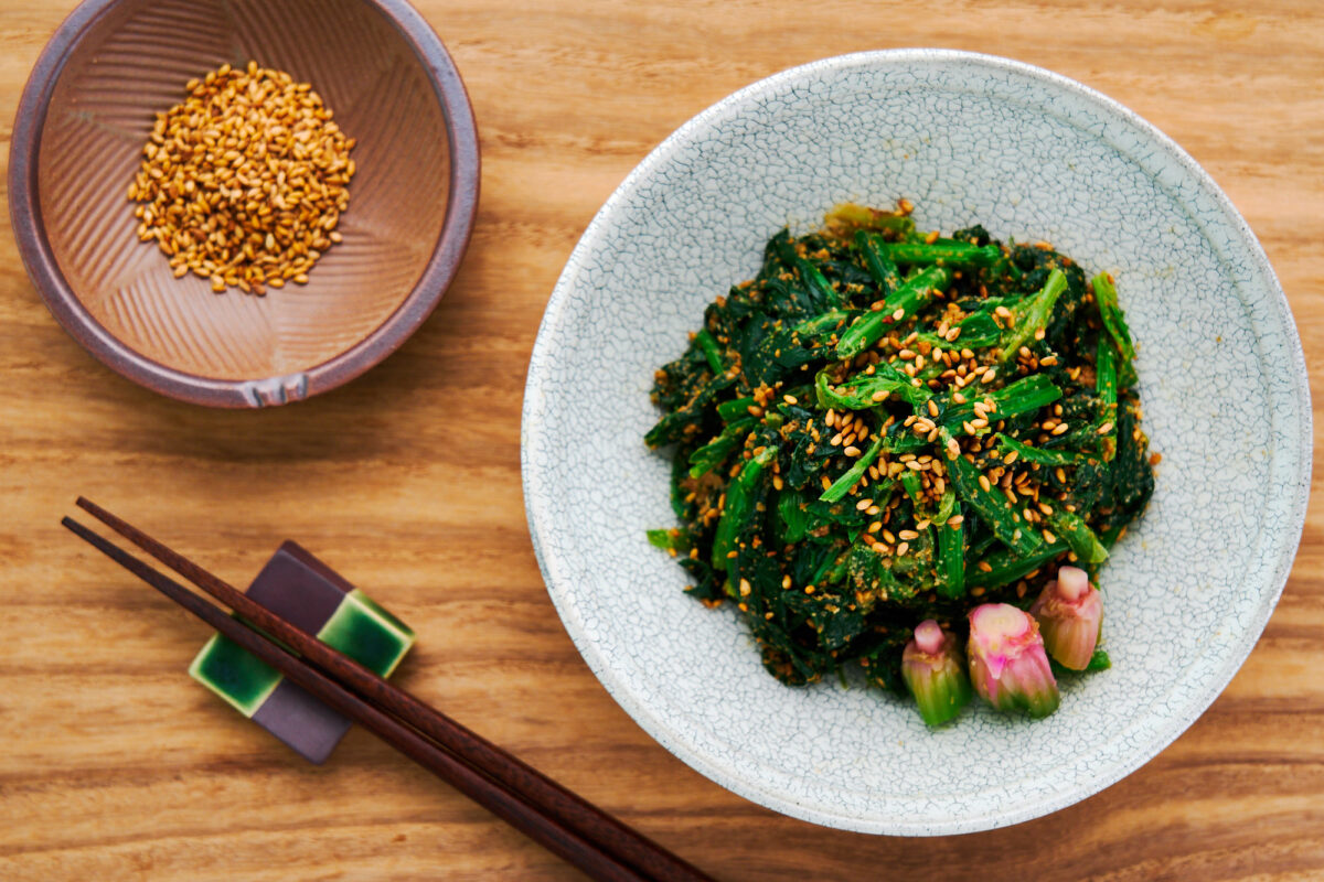 Sesame spinach (goma ae) is a traditional Japanese side dish made with just spinach, sesame seeds, soy sauce, and sugar.