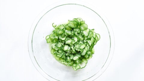 The salt makes the cucumbers release water, making them crunchy instead of crisp.