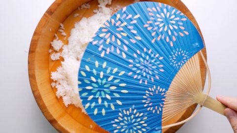 Using a fan to rapidly cool sushi rice.