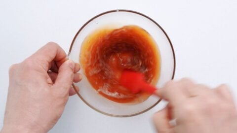 Mixing garlic sauce for Stamina Rice Bowl.