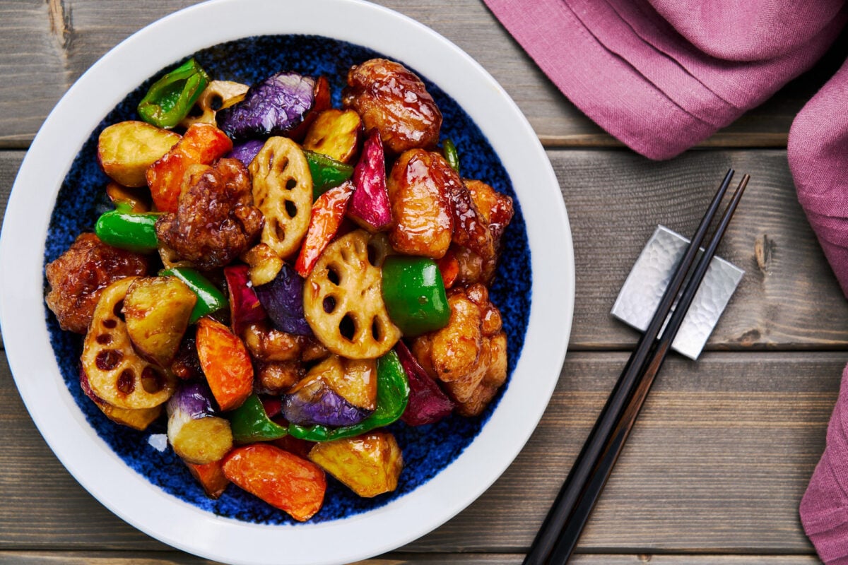 Sweet and Sour chicken and vegetables glazed in a sweet, sour and savory black vinegar sauce.