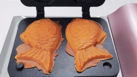 Golden brown taiyaki in a mold.