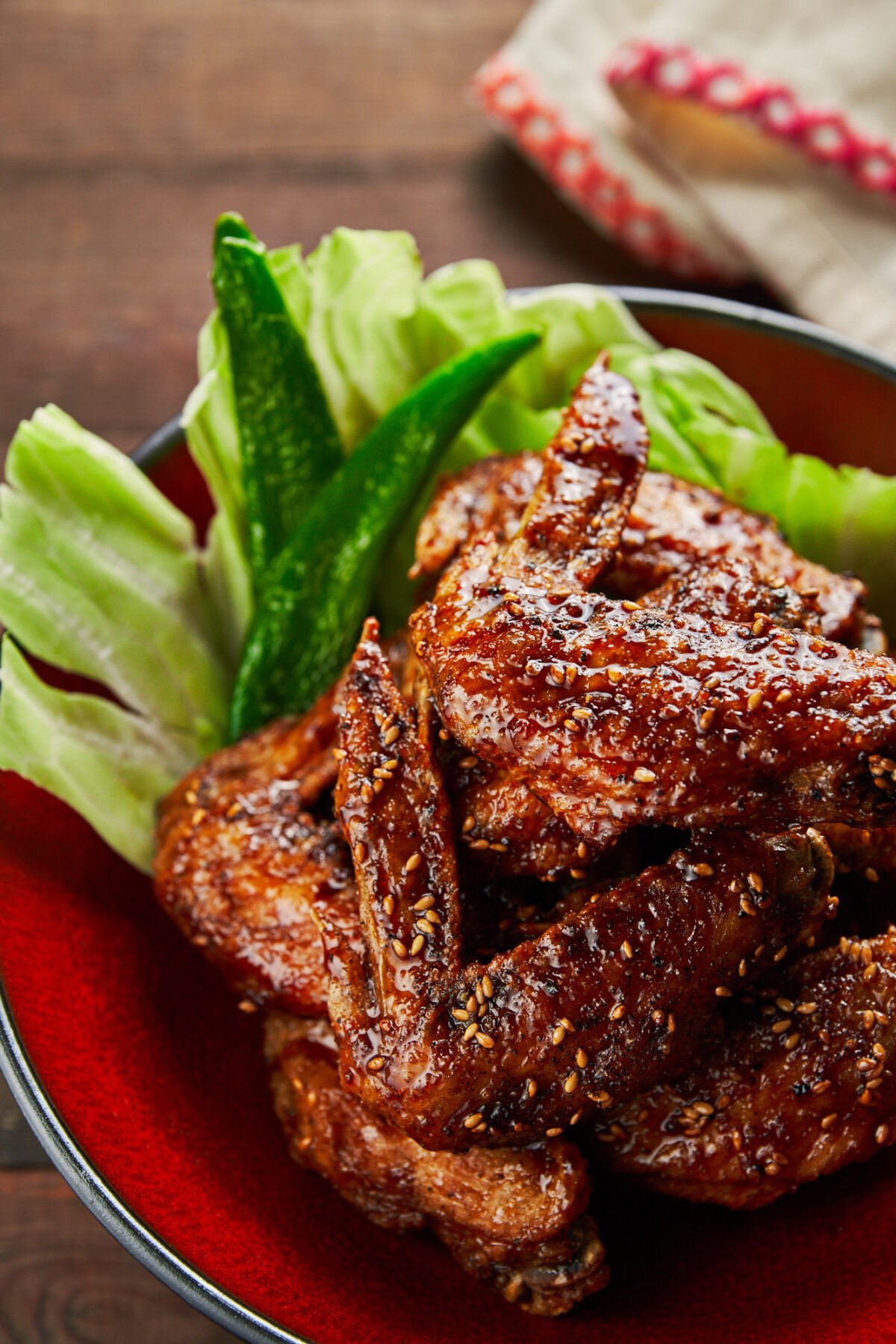 Secrets to making the crispiest wings ever! Glazed in a sweet and savory sauce that's loaded with ginger, garlic and black pepper this Tebasaki recipe is dangerously addictive.