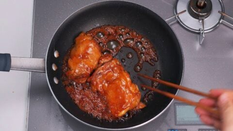 Glaze the chicken with teriyaki sauce.