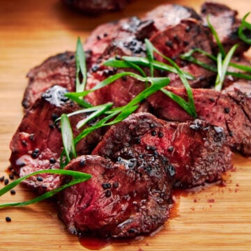 Grilled hanger steak marinated with ginger and garlic and glazed with a simple 3 ingredient teriyaki sauce.