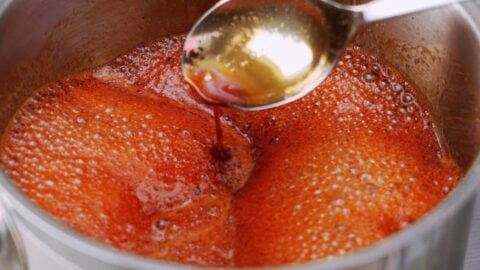 Teriyaki sauce boiling in a pot.