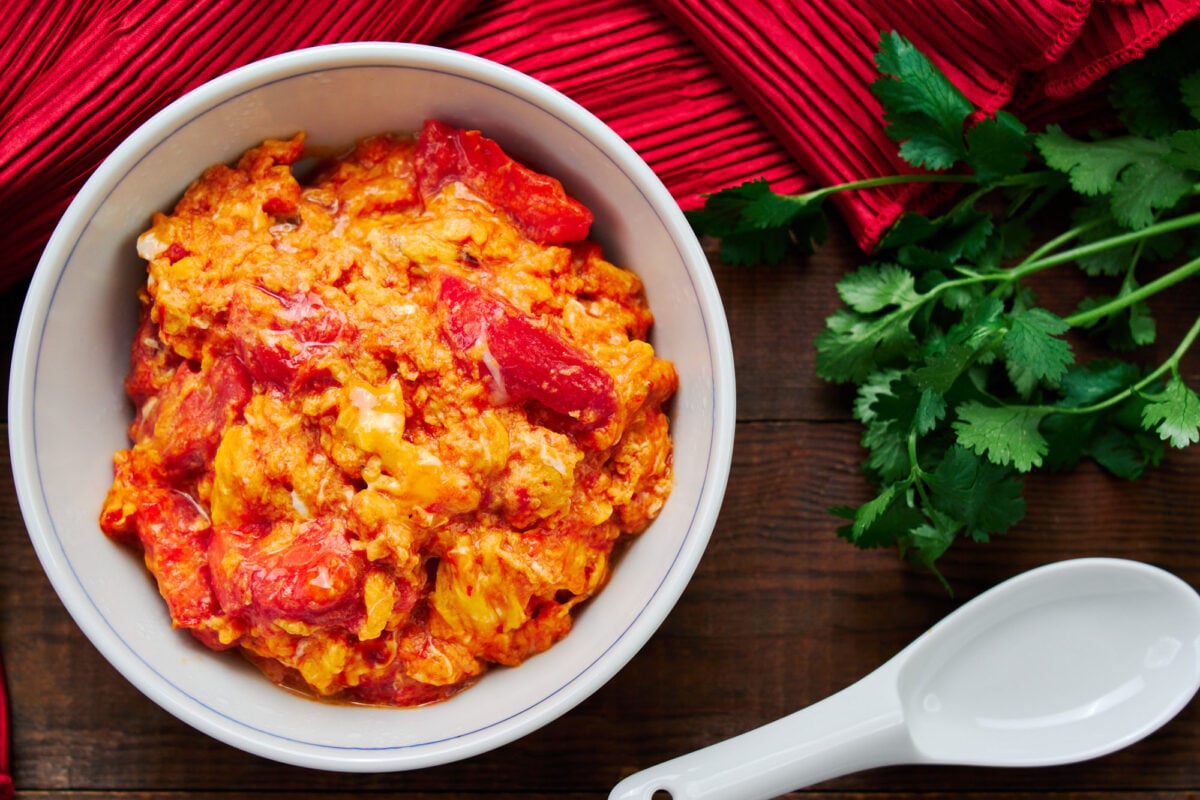 A bowl of Chinese scrambled eggs with stir-fried tomatoes makes for a satisfying meal.