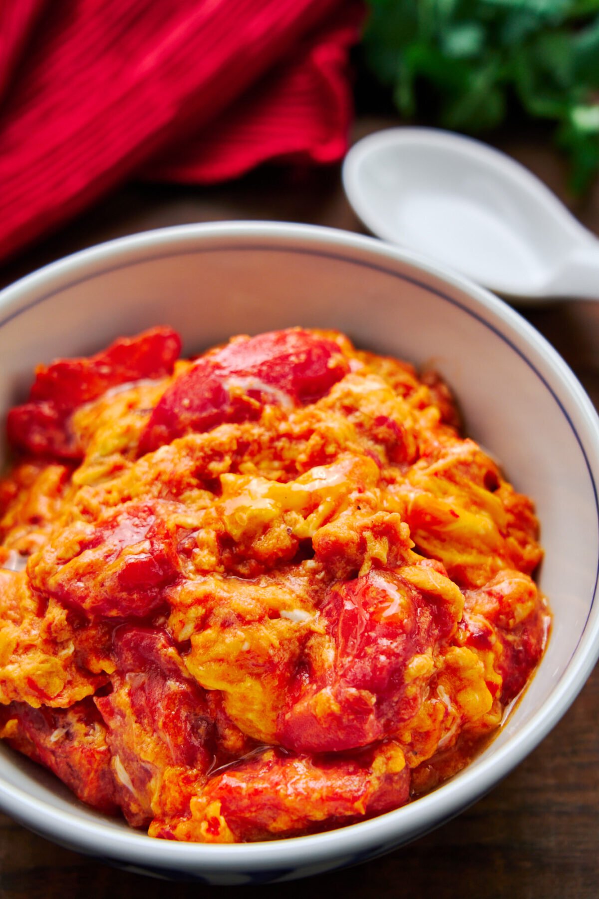 This easy Chinese stir fry combines juicy tomatoes with rich, creamy scrambled eggs to make for a satisfying meal that comes together in minutes.