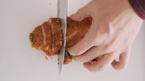 Slicing Crispy Tonkatsu.