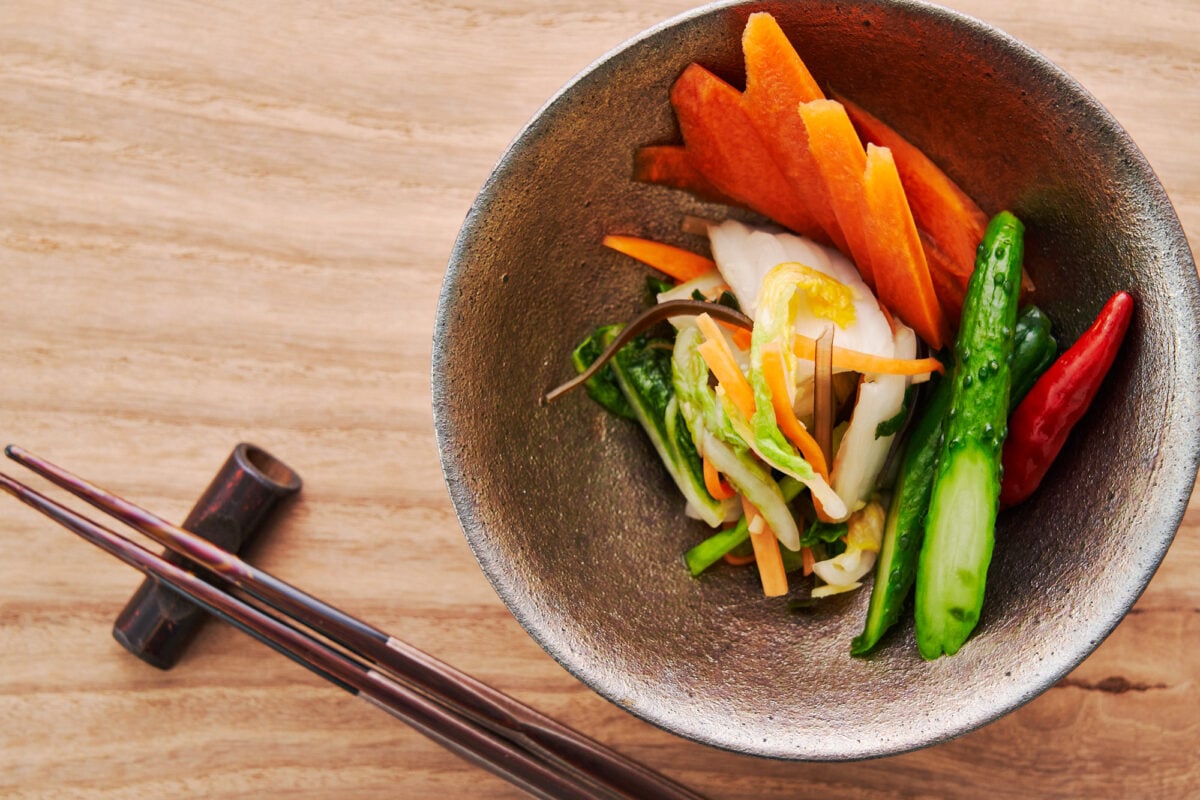 A plate of Japanese Pickles, or Tsukemono with salt pickles (shiozuke), soy sauce pickles (shoyuzuke), and fresh pickles (asazuke).