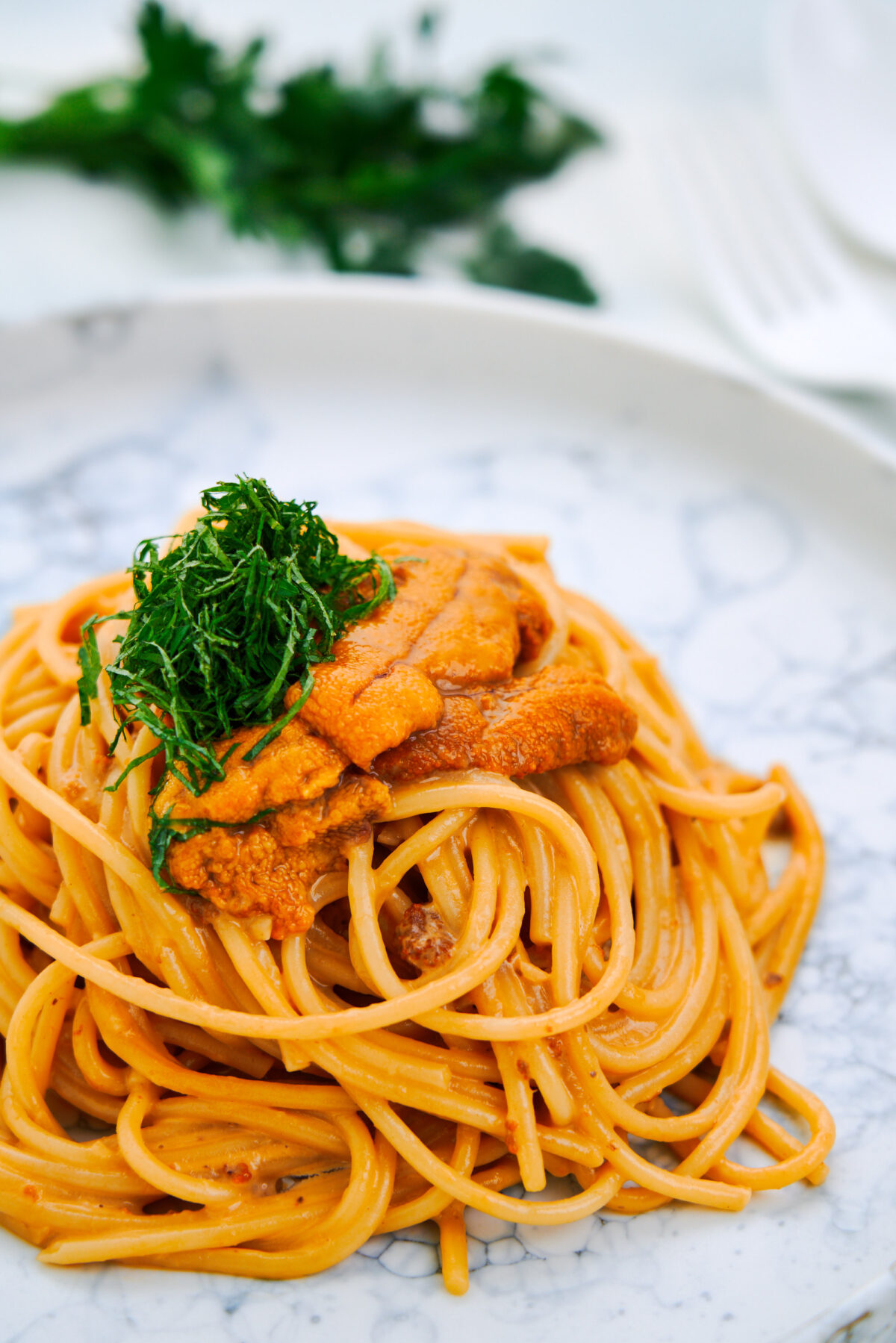 With spaghetti tossed with a creamy umami-packed uni sauce, this easy Japanese-style pasta highlights the briny flavor of this treasure from the sea.