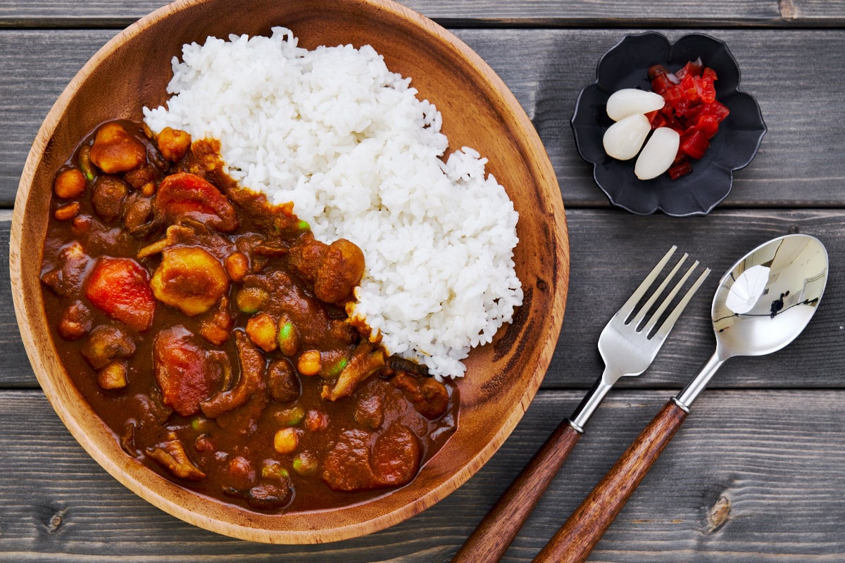 Mushrooms, beans, and vegetables in an unctuous Japanese curry sauce served with rice.