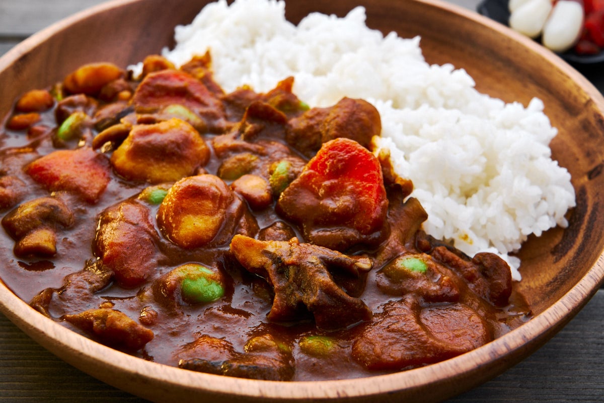 A plate of rich, unctuous Japanese curry rice, but this one's made with plants and mushrooms, making it vegan and vegetarian friendly.