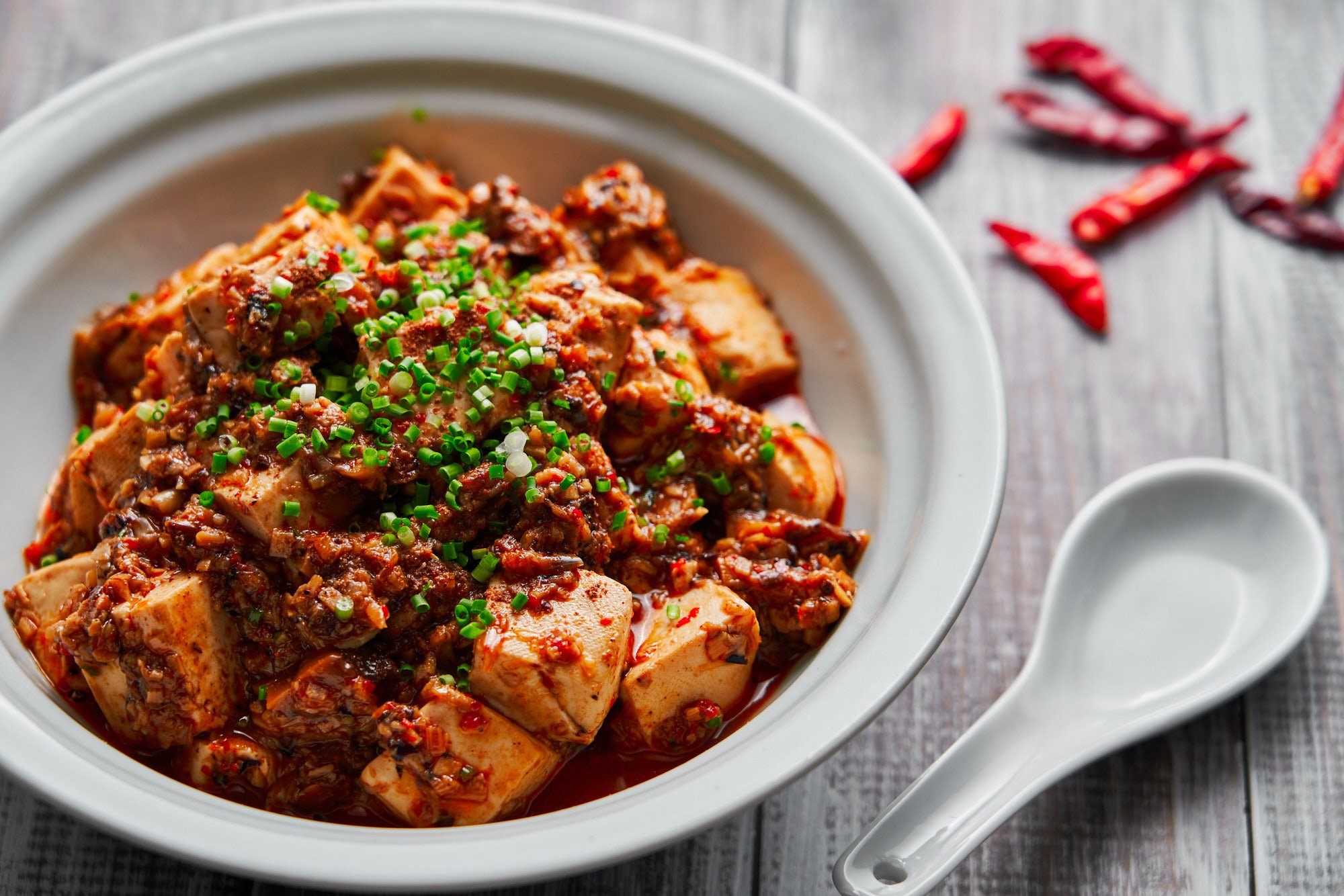 With loads of aromatics and mushroom ground "meat" in the red hot sauce, this vegan Mapo Tofu is brimming with savory umami.