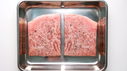 A5 Grade Wagyu Sirloin in a stainless steel tray.