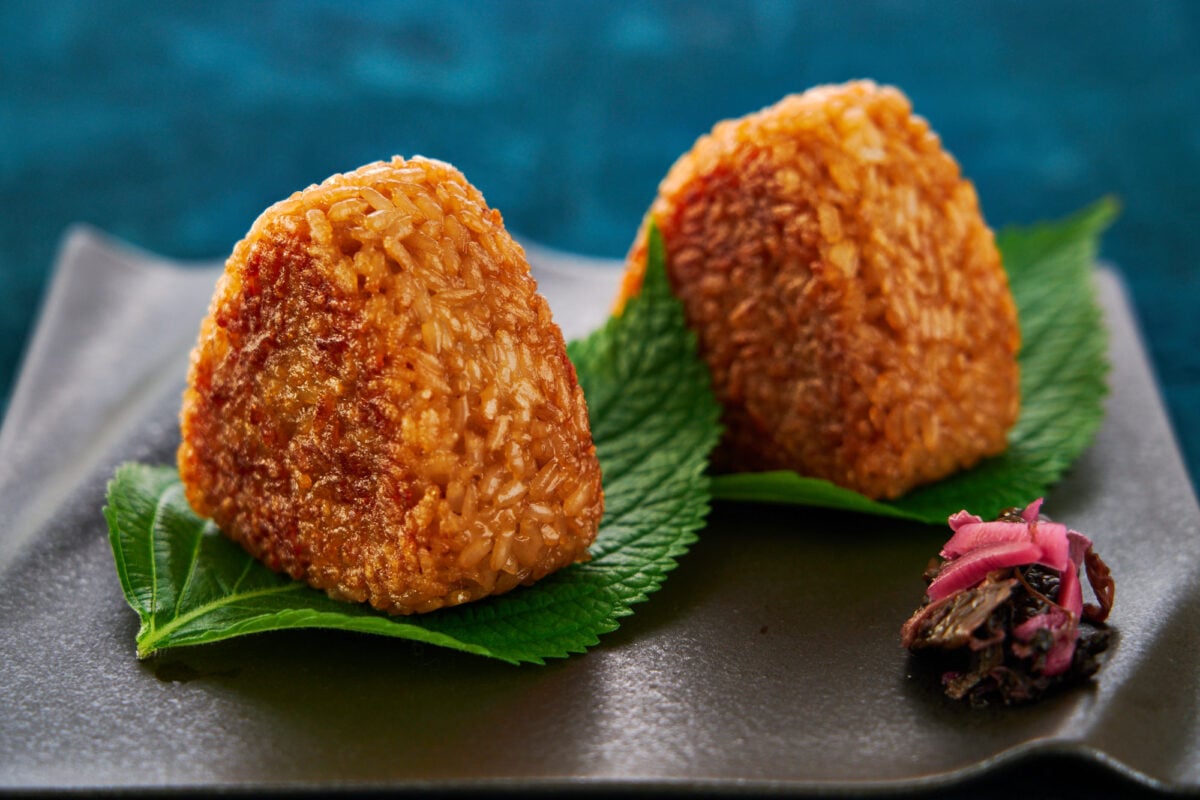 Grilled rice balls or yaki onigiri served wrapped with perilla leaves.